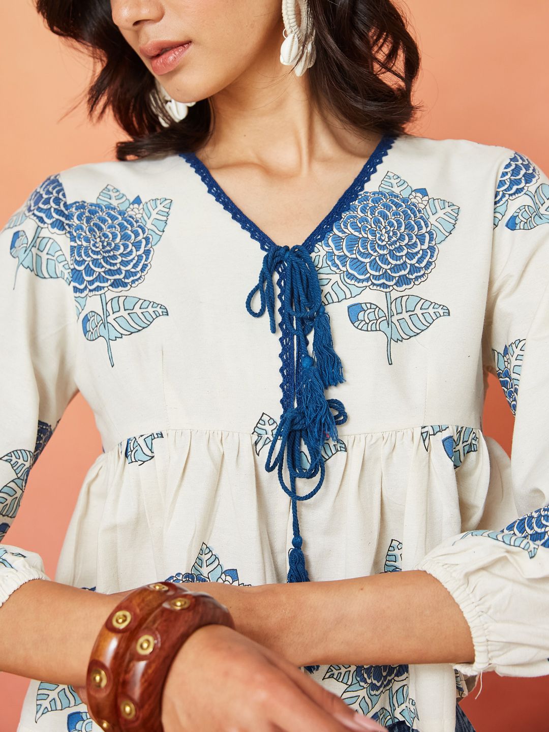 Cream and Blue Pure Cotton Floral Print Peplum Crop Top Featuring Bishop Sleeves and a Front Tie-Up Design